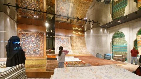 Panoramic view through the glass window of an oriental, eastern carpet Stock Photos