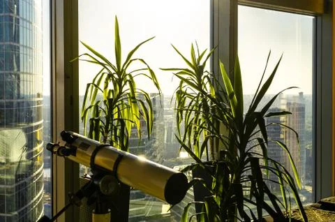 Panoramic view through the office window of skyscraper in business center with Stock Photos