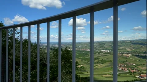 Panoramic view through the terrace railing, Tilt 4K Video stock 277114294