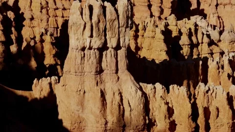 Panoramic view tilts across Bryce Canyon hoodoo rock formations Stock Footage 329558857