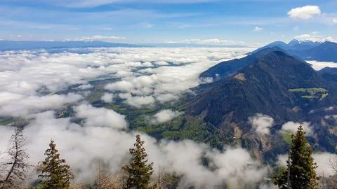 A panoramic view from the top of Alpine peak in Austria. The whole area is .. Stock Photos