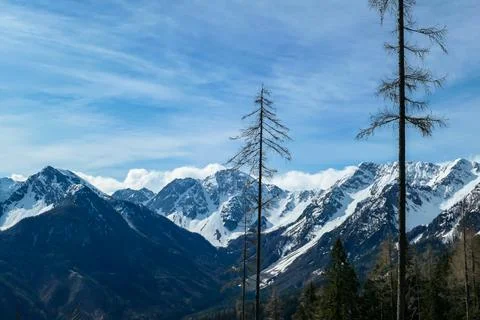 A panoramic view from the top of Alpine peak in Austria. The whole area is .. Stock Photos