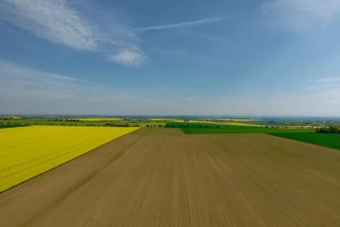 Panoramic view from the top of the fields in the countryside. Stock Photos