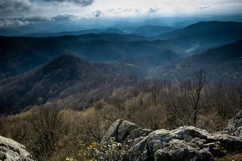 Panoramic view from the top of a mountain spreading across the whole valley Stock Photos