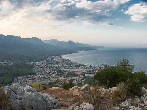 Panoramic view from the top of the mountain at sunset.View of the city of Kemer Stock Photos