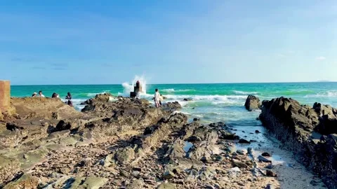 Panoramic view of tourists visiting and exploring the fascinating rock format Stock Footage 326676521