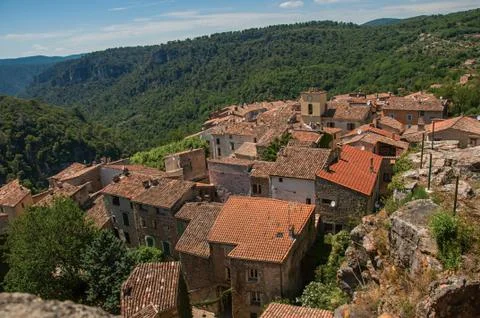 Panoramic view of tower on top of hill with Chateaudouble underneath. Stock Photos