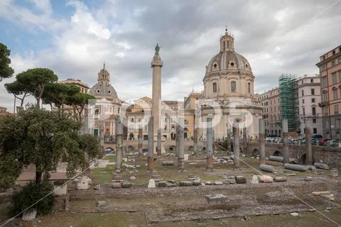 Panoramic view of Trajan's Forum and Column in Rome, far away the Church Stock Photos