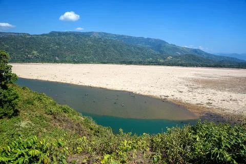 Panoramic View of a Tranquil River and Sandy Riverbed in a Mountain Valley Stock Photos