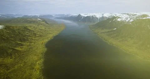 Panoramic view of a tranquil river winding through mountainous terrain Illustrazione stock