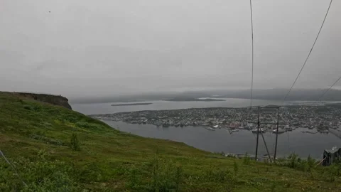 Panoramic view of Tromso city and fjord from Storsteinens mountain slope Vídeos de archivo 341697306