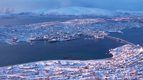 Panoramic view to Tromso harbor. White yacht sailing at sunset In Norway Stock Footage 252148181