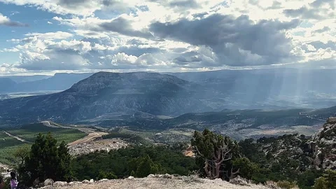 Panoramic view of Turkish mountains with dramatic sky and sun rays Stock Footage 306842133