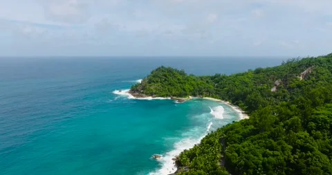 Panoramic view of turquoise waters and lush tropical vegetation. Seychelles Stock Footage 311494207