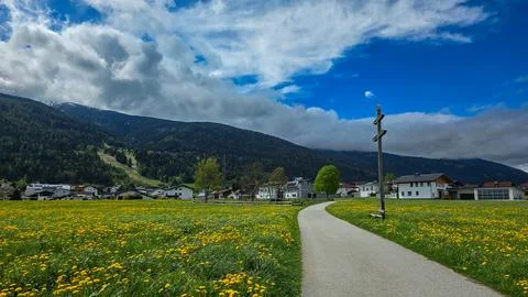 Panoramic view of the typical alpine town Goetzens in Austria. In the foreground Stock Photos