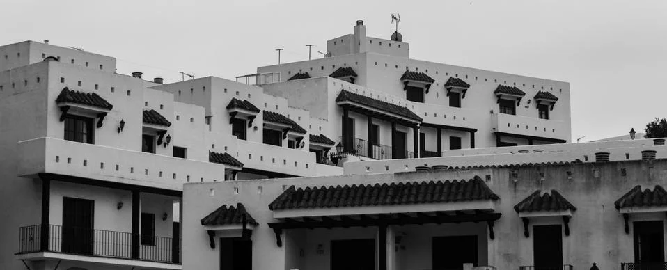 Panoramic view of a typical Andalusian white village in black and white Stock Photos