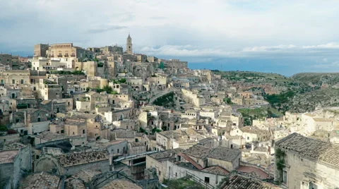 Panoramic view of typical stones (Sassi di Matera) and church of Matera Stock Footage 67887400