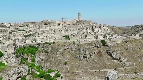 Panoramic view of typical stones Sassi di Matera and church Stock Footage 78124188