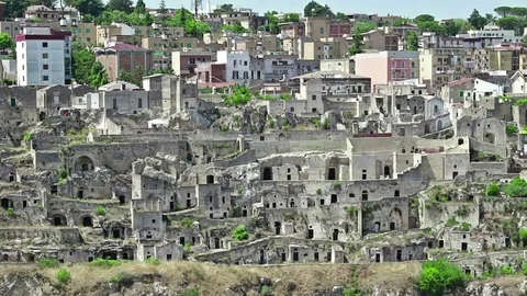 Panoramic view of typical stones Sassi di Matera and church Stock Footage 78124612