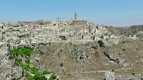 Panoramic view of typical stones Sassi di Matera and church of Matera Stock Footage 80043822