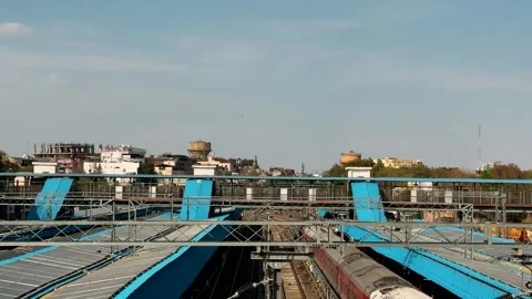 A Panoramic View of Urban Railway Infrastructure Highlighting Trains and Platfor Stock Footage 335203496