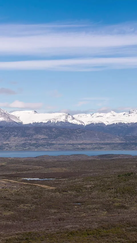 Panoramic view of a valley with mountains at Puerto Natales, Chile Stock Footage 313737621