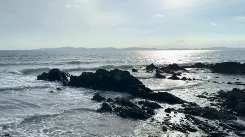 Panoramic view of Van Chay beach with unique sedimentary rock formations Stock Footage 326676380