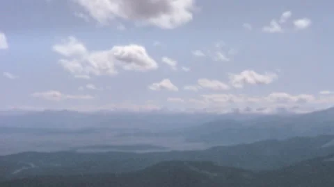 Panoramic View Of Vast Snow Capped Rocky Mountains Colorado 1960s 動画素材 347123919