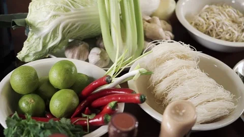 Panoramic view of vegetables and fish on a kitchen table professional chef Video stock 73210657