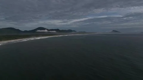 Panoramic view very long beach Atlantic Ocean, well forest, lake and mountains Stock Footage 262434648