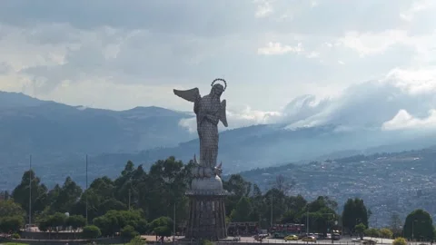 Panoramic view of the Virgin of El Panecillo statue with Quito city and the 스톡 동영상 308403596