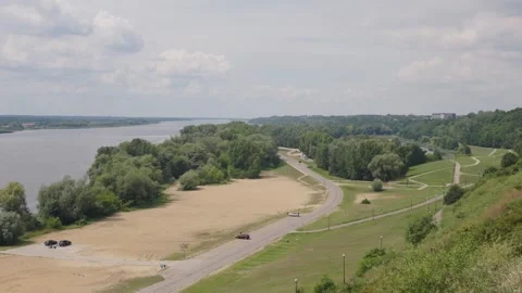 Panoramic view of the Vistula River from a high bank in Plock with green trees Видео 331502082