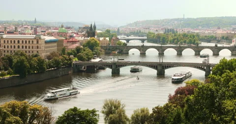 Panoramic View of Vltava River with Tourist Boats and Charles Bridge in Prague Stock Footage 342732591
