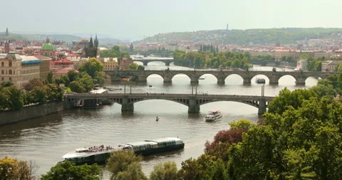 Panoramic View of Vltava River with Tourist Boats and Charles Bridge in Prague Stock Footage 342732625