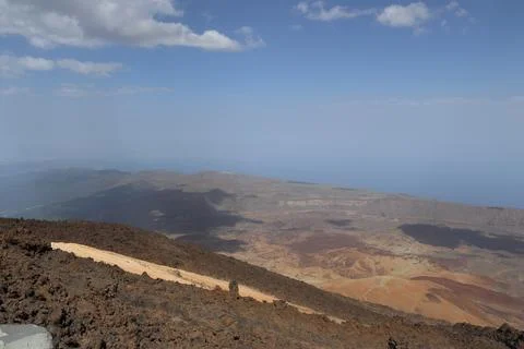 Panoramic view of volcanic lanscape in front of the ocean from the peak of mo Stock Photos