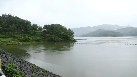 Panoramic view of Water Dam Sermo in Yogyakarta, Indonesia at cloudy rain Stock-Footage 145251270
