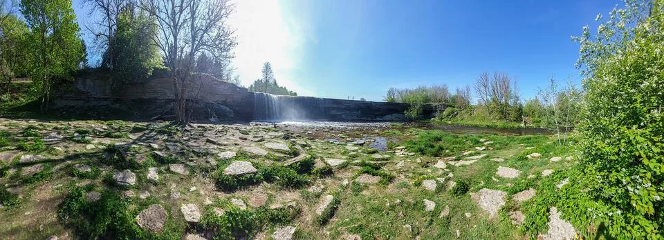 Panoramic view of the waterfall in the park Stock Photos