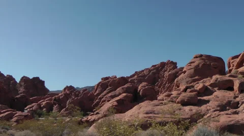 Panoramic view on wavy rocks of Valley of Fire State park, NE Vidéo 60014294