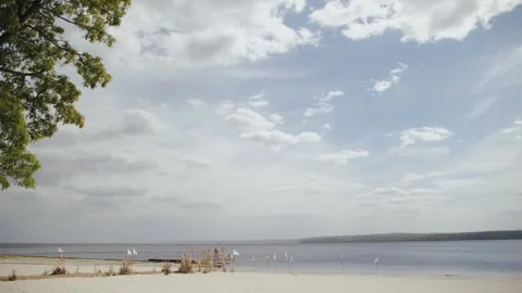 Panoramic view wedding beach set up seaside with minimalist pampas grass arch Stock Footage 308450811