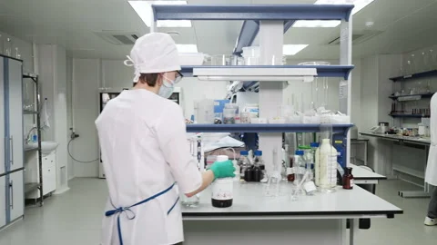 Panoramic View Of A Well-Equipped Laboratory with Technicians Working There Video stock 210239341