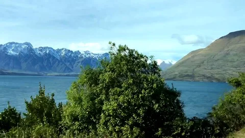Panoramic view while Driving through mountains in Queenstown, New Zealand Stock Footage 95621074