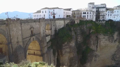 Panoramic View of White Houses and Puente Nuevo in Ronda Stock Footage 336007694