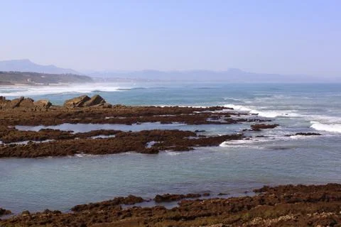 Panoramic view of a wild coast Stock Photos
