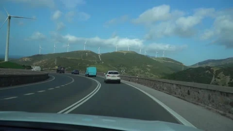 Panoramic view of wind farm or wind park. Green energy concept. Stock Footage 208666958