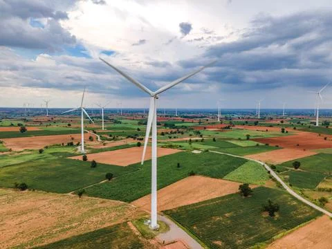 Panoramic view of wind farm or wind park. Stock Photos