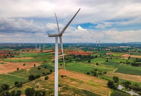 Panoramic view of wind farm or wind park. Stock Photos