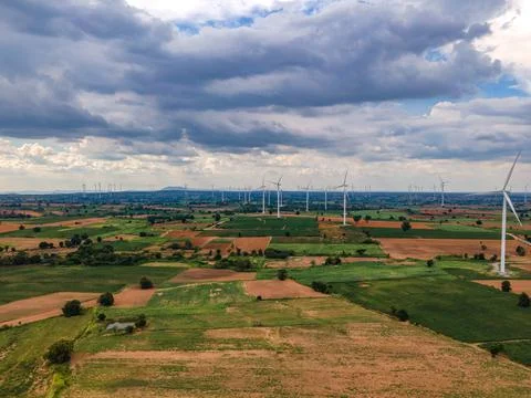 Panoramic view of wind farm or wind park. Stock Photos