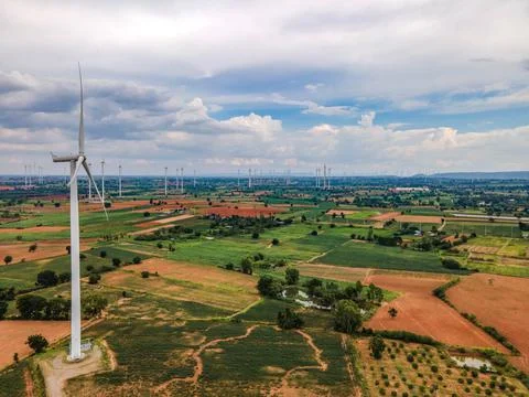 Panoramic view of wind farm or wind park. Stock Photos
