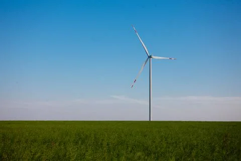 Panoramic view of wind farm or wind park, with high wind turbines for generat Stock Photos