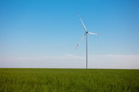 Panoramic view of wind farm or wind park, with high wind turbines for generat Stock Photos